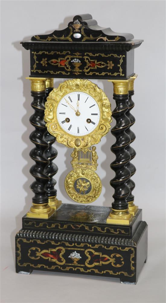 A 19th century French brass inlaid portico clock 51cm.